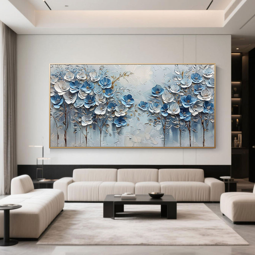 Blue floral 3D textured wall art in a modern living room setting.