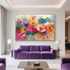 Vivid flower artwork in red, blue, yellow tones, hand-painted with eco-conscious paint, framed and ready to hang.