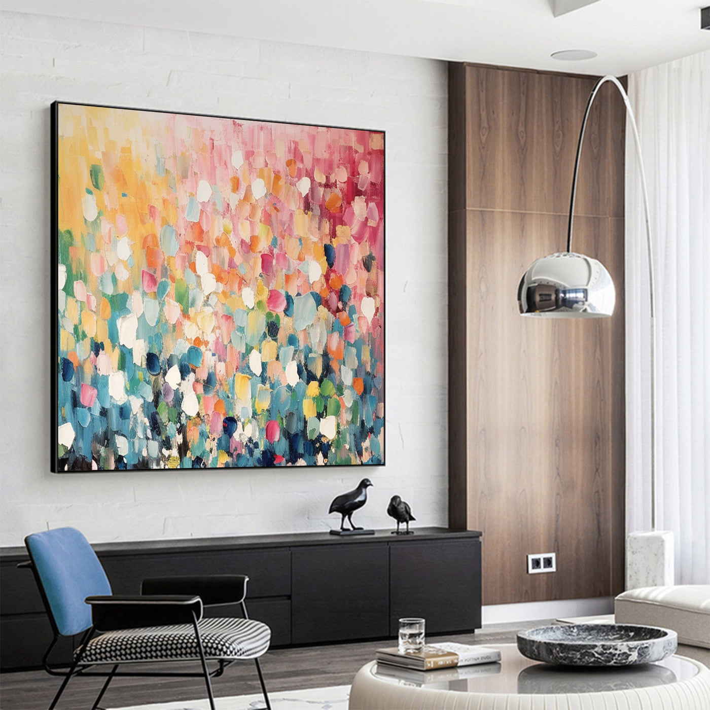 Colorful abstract floral art in a modern living room setting.
