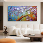 Minimalist room with Floral Mirage canvas art above a white sofa.