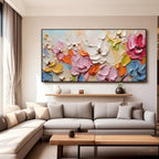 Contemporary living room featuring the 'Petal Chorus' floral canvas wall art.