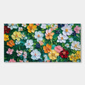 A close-up of Bloomage 3D floral wall art featuring sculpted, colorful petals on a green backdrop.