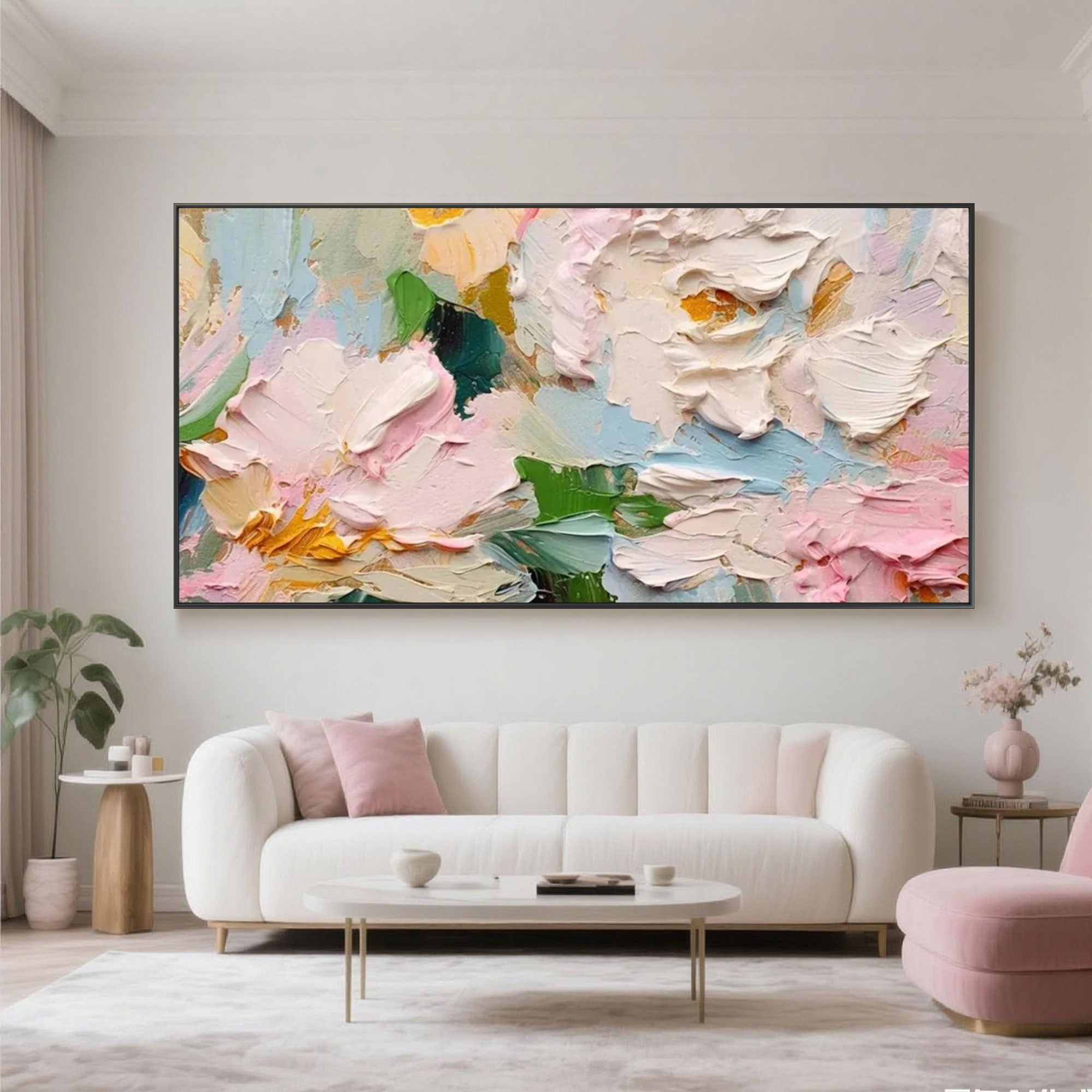Colorful Blossom Tide floral wall art over a sofa in a bright living room interior.