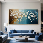 Abstract floral canvas art displayed above a blue sofa in a living room setting.