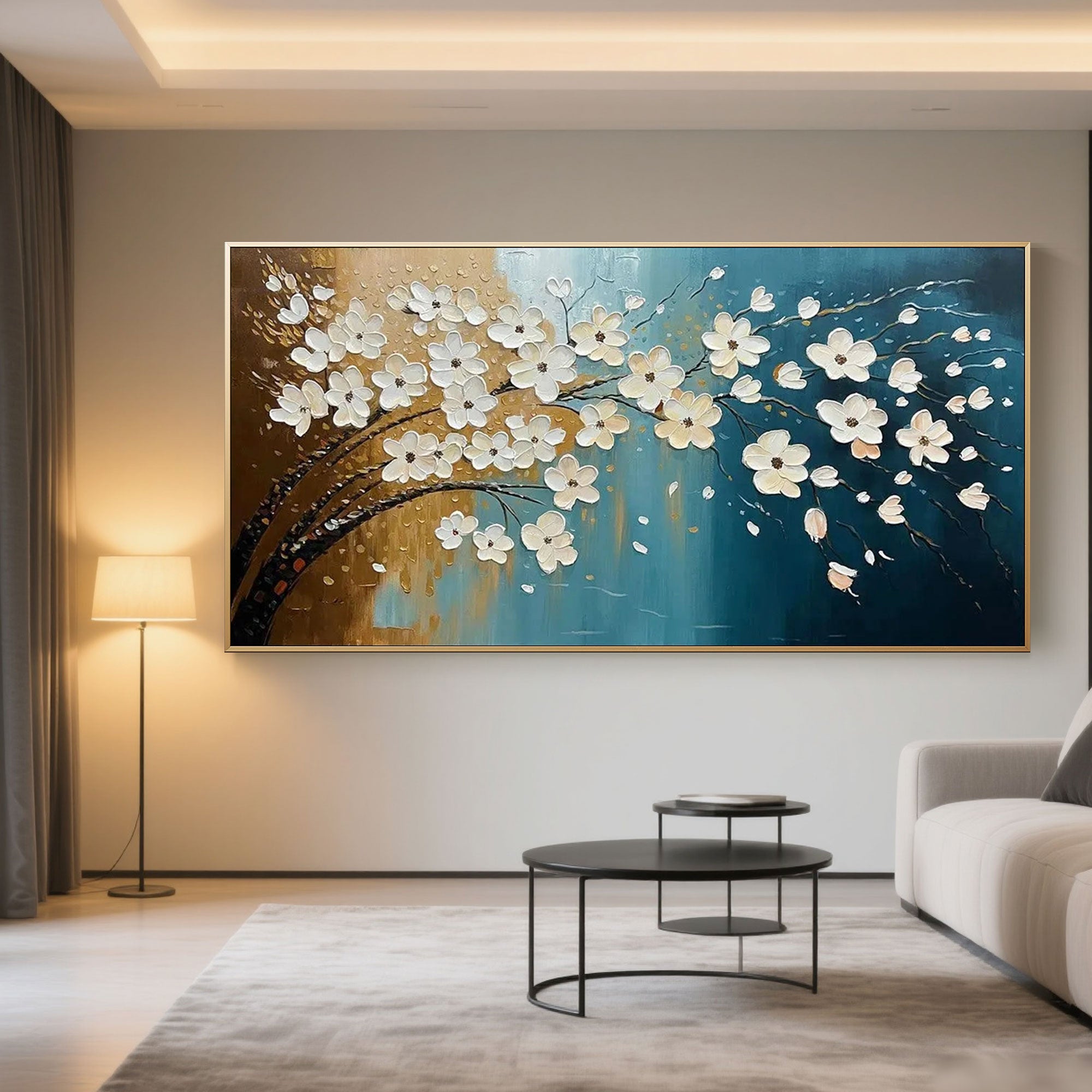 Abstract floral canvas art displayed above a blue sofa in a living room setting.