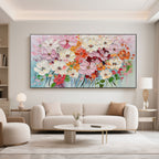 Florence colorful floral canvas art displayed above a modern living room sofa.