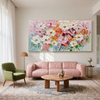Colorful Florence floral art print complements a pink sofa in a bright living room.