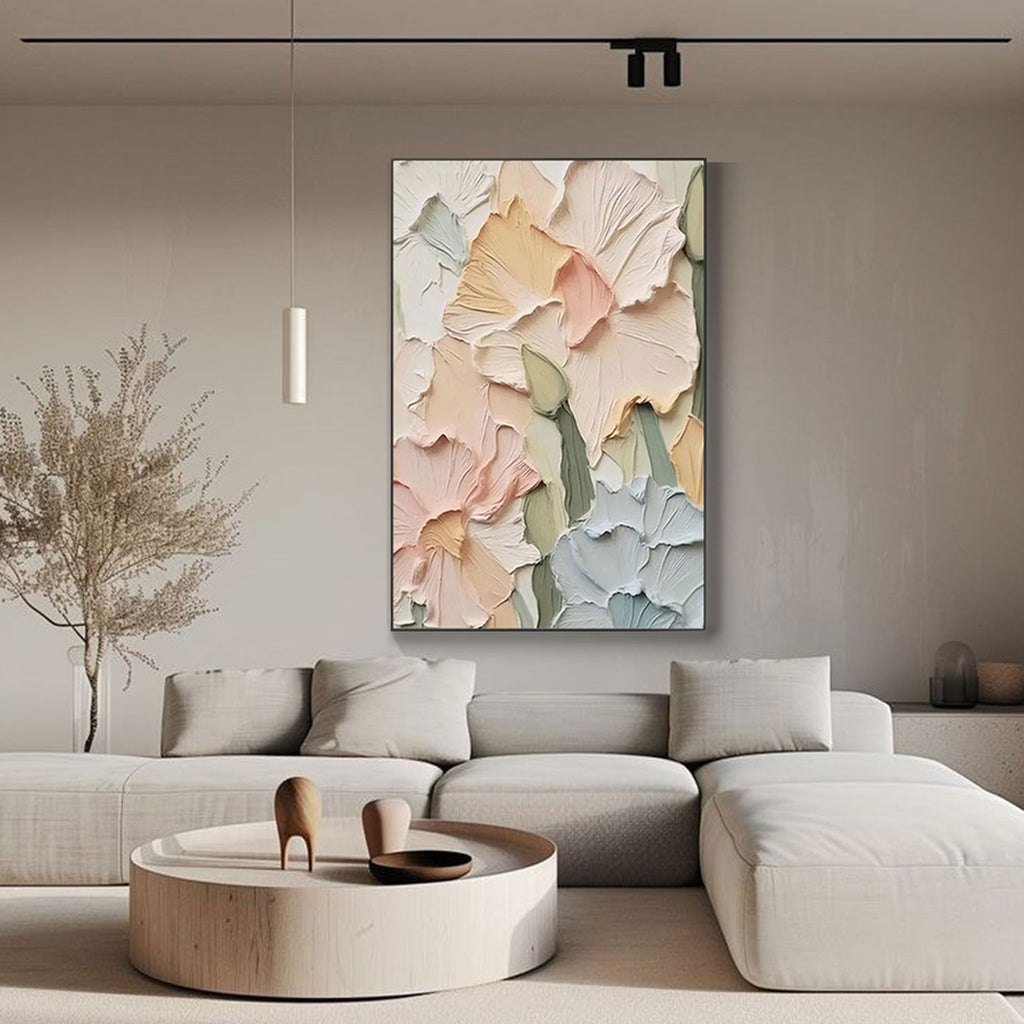 Floral textured canvas art in a living room setting with a gold frame.