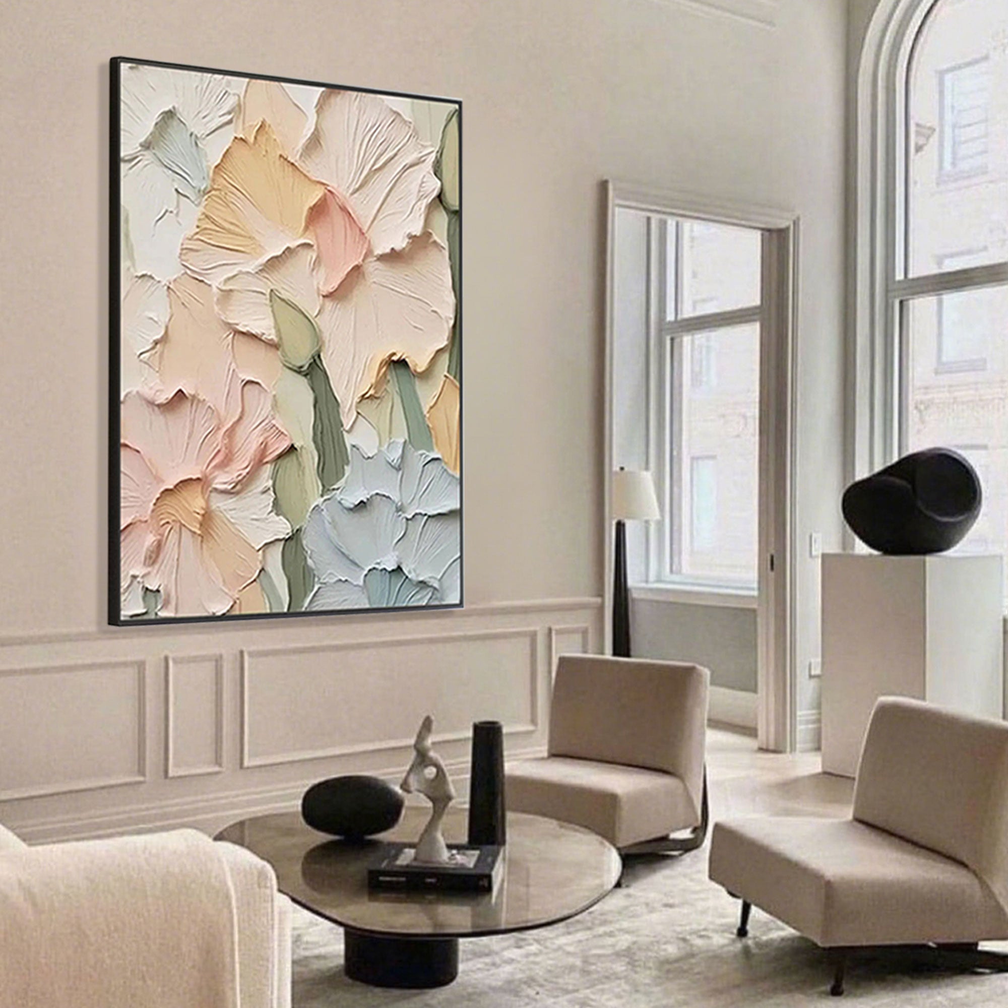 Large floral wall art with 3D textures displayed in a bright modern living room.