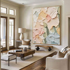 Large floral wall art with 3D textures displayed in a bright modern living room.