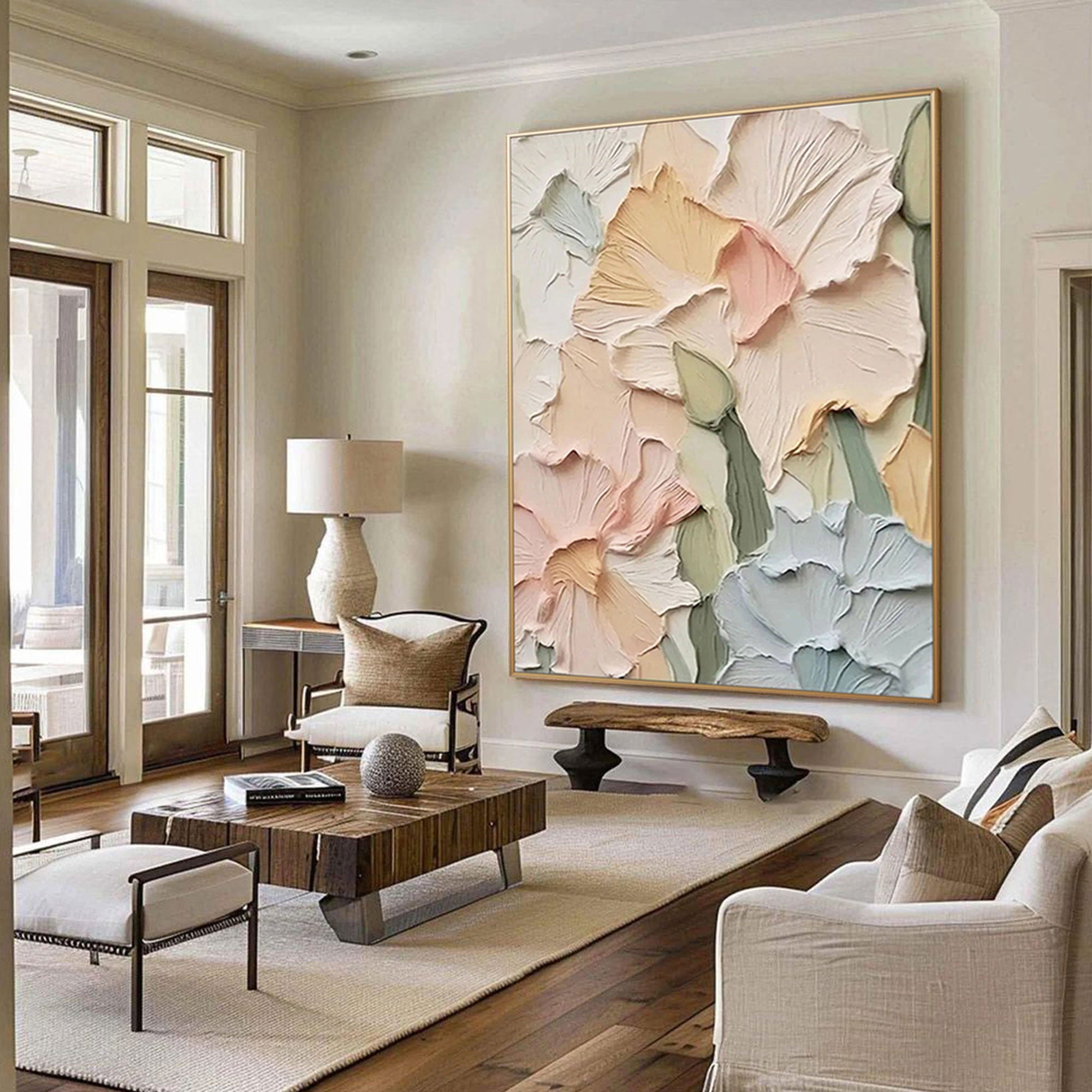 Large floral wall art with 3D textures displayed in a bright modern living room.