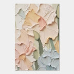 Close-up of a 3D textured floral painting with pink, yellow, and blue petals.