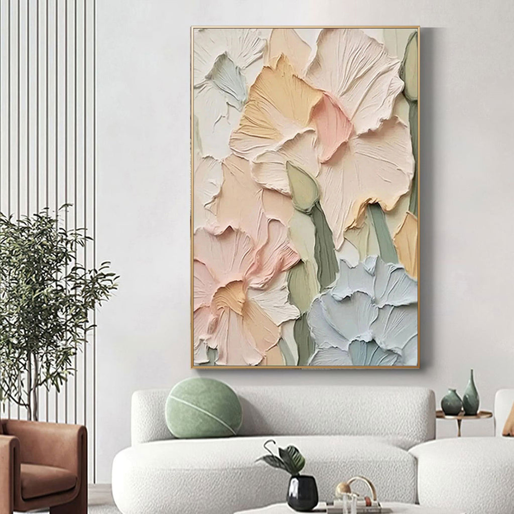 Floral textured canvas art in a living room setting with a gold frame.