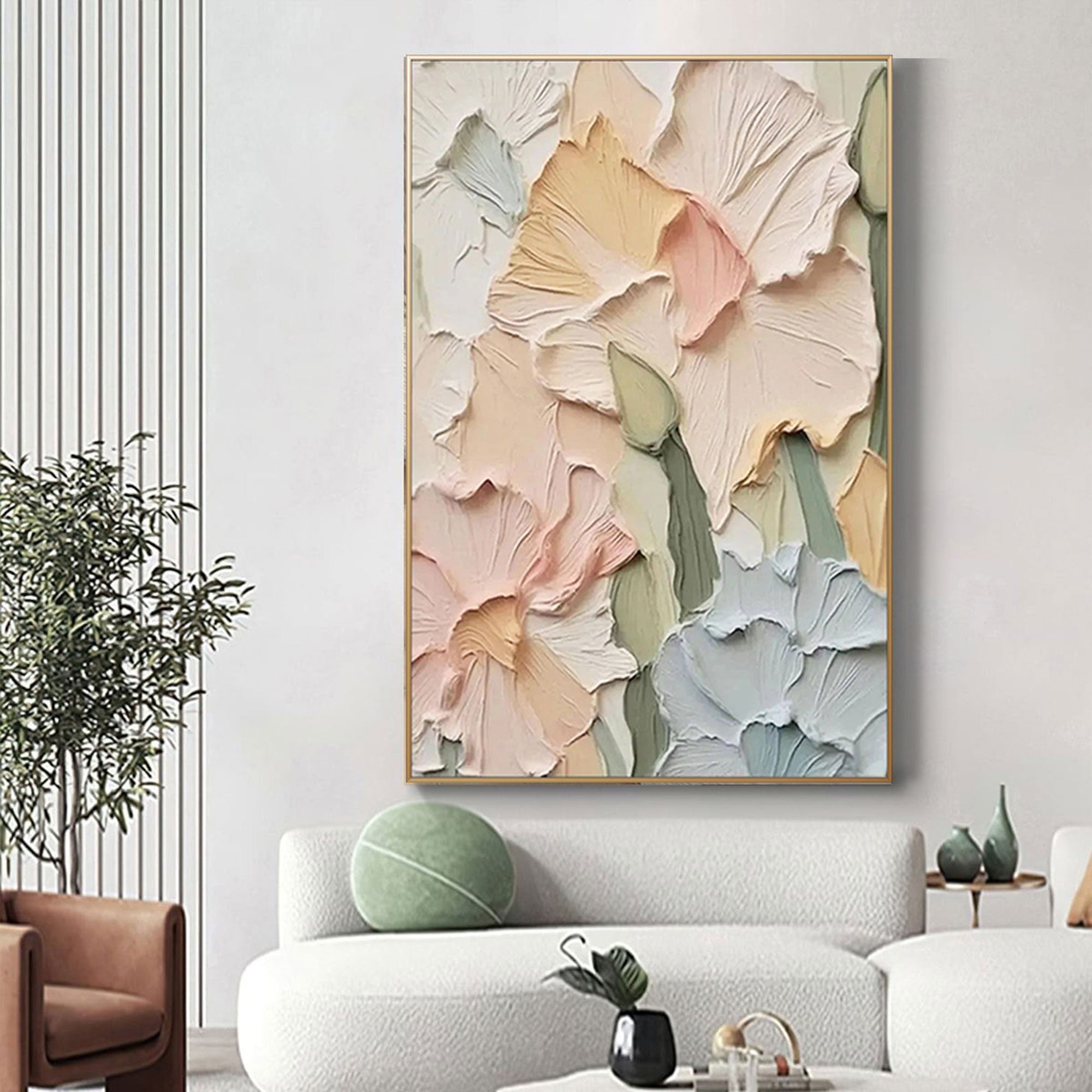 Floral textured canvas art in a living room setting with a gold frame.