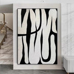 Black and white abstract line art, showcasing minimalist style, with black lines weaving across a white background, adding an artistic touch to modern interiors.