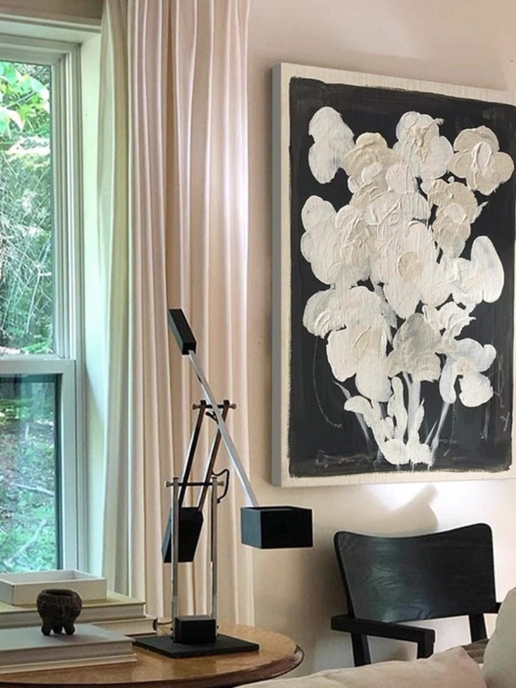 Hand-painted oil artwork depicting abstract flower silhouettes in neutral tones, perfect for modern or retro interiors.