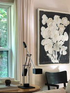 Hand-painted oil artwork depicting abstract flower silhouettes in neutral tones, perfect for modern or retro interiors.