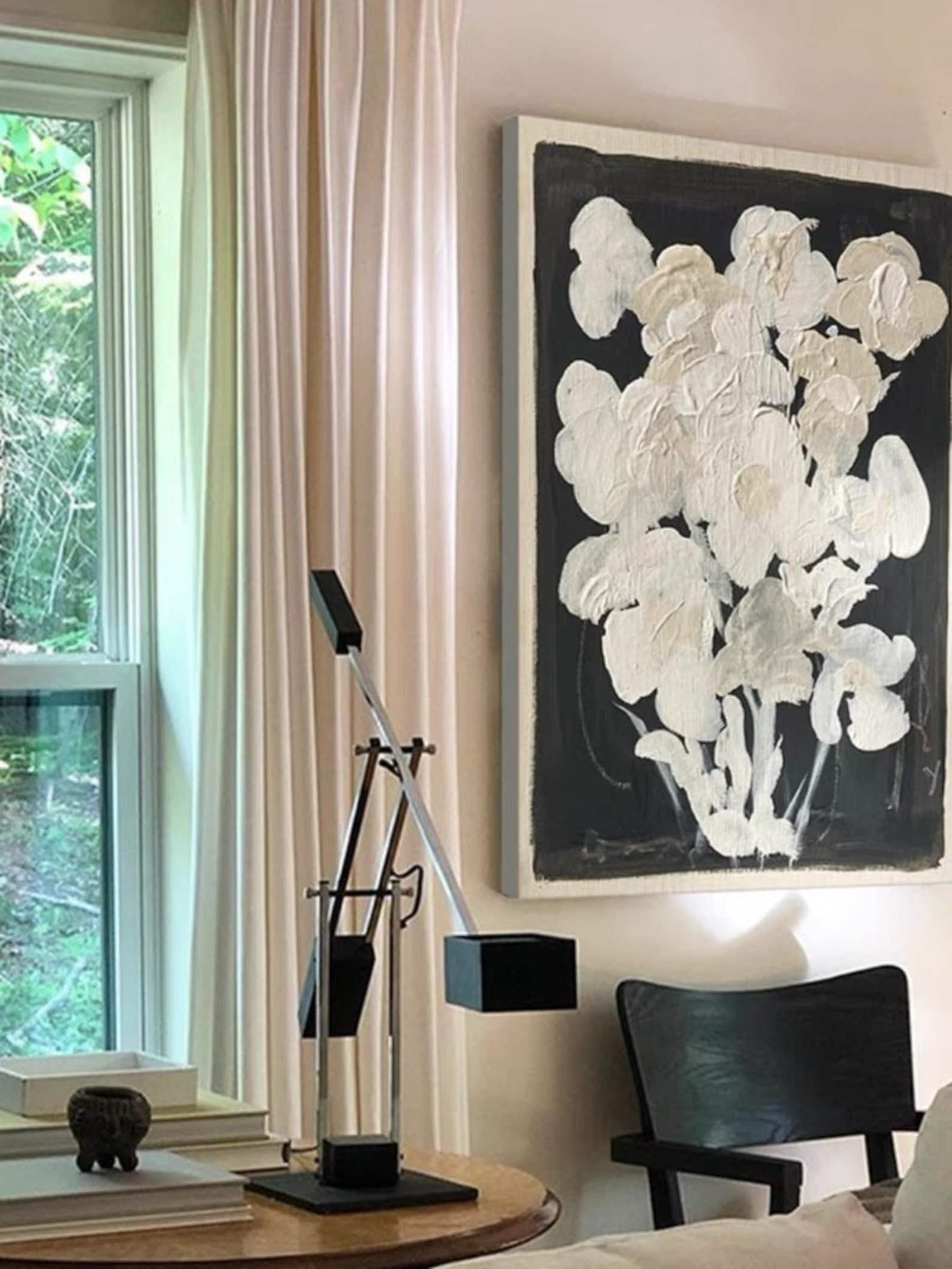 Hand-painted oil artwork depicting abstract flower silhouettes in neutral tones, perfect for modern or retro interiors.