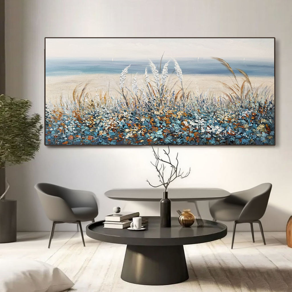 Impressionist hand-painted canvas art of blue wildflowers & coastal beach in modern living room