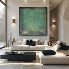 Minimalist hand-painted art on square canvas hung above modern bench and side table