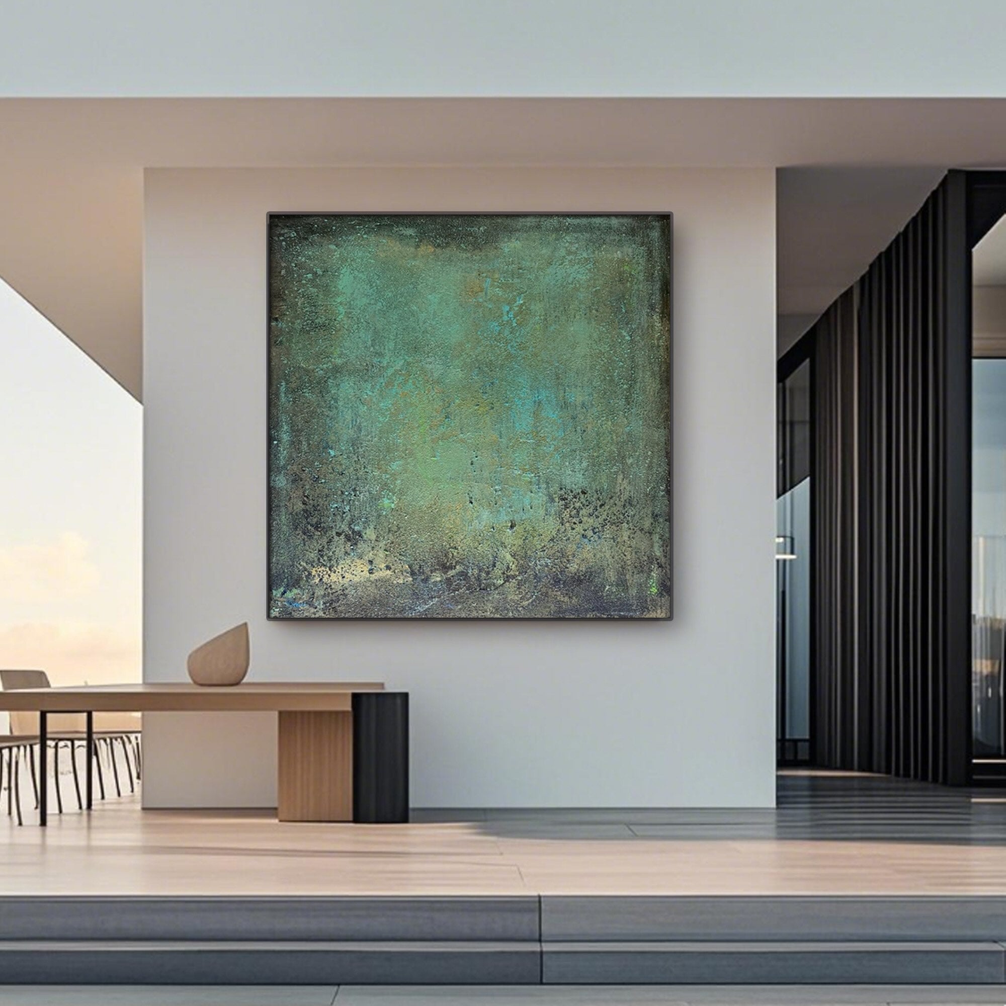 Mid-century abstract green canvas art styled in a minimalist beige living room