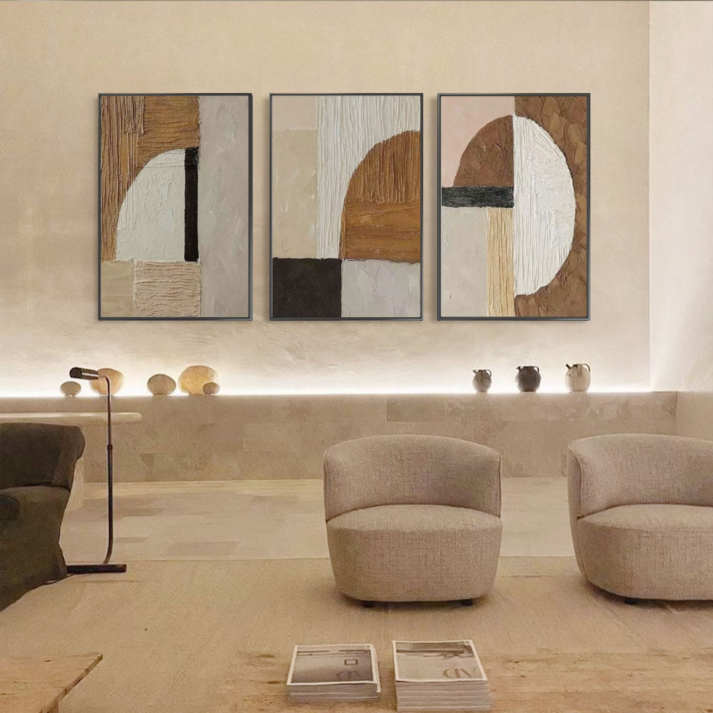 Fragment geometric canvas art displayed in a minimalist seating area.