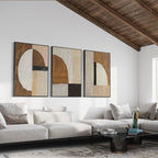 Modern living room with Fragment mid-century geometric wall art in neutral tones.