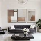 Mid-century geometric art set in living room with grey sofa