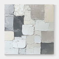 Minimalist abstract canvas art with textured blocks in soft white, grey, and beige tones.