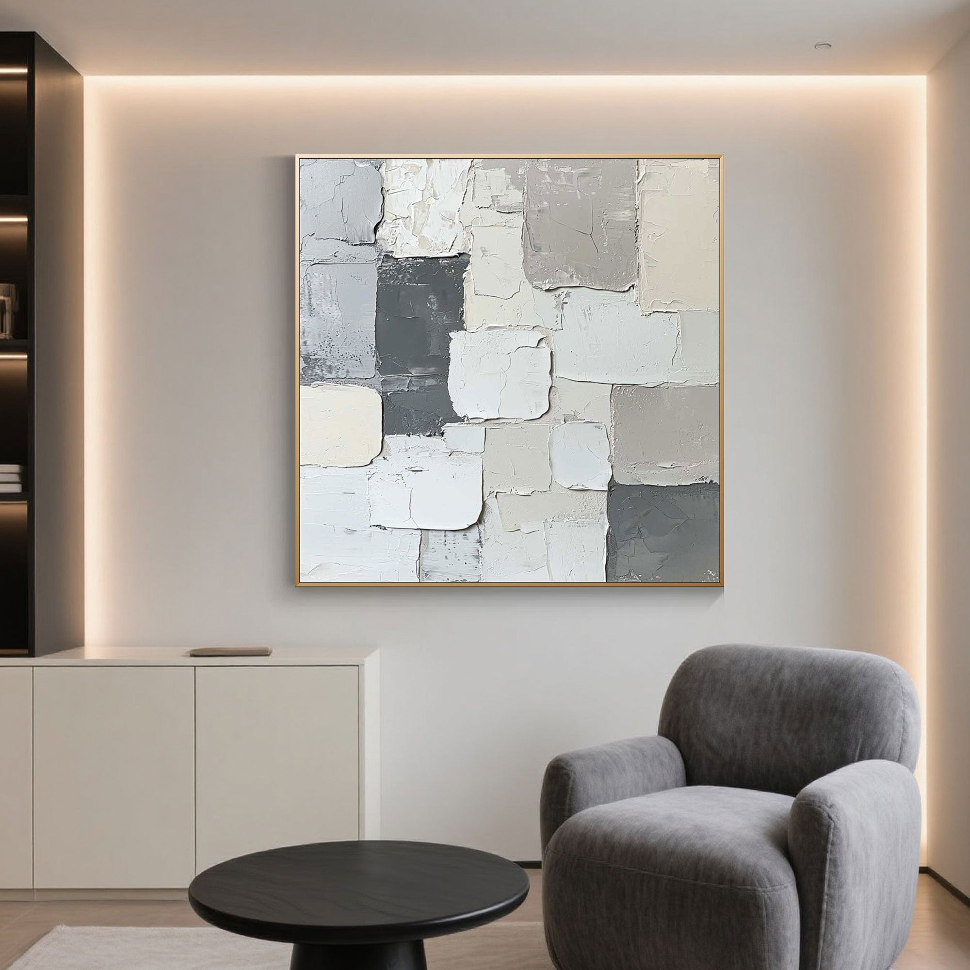 Minimalist abstract canvas art with textured blocks in soft white, grey, and beige tones.