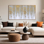 Minimalist abstract floral wall art with golden cascading botanical elements on a soft grey-white background.