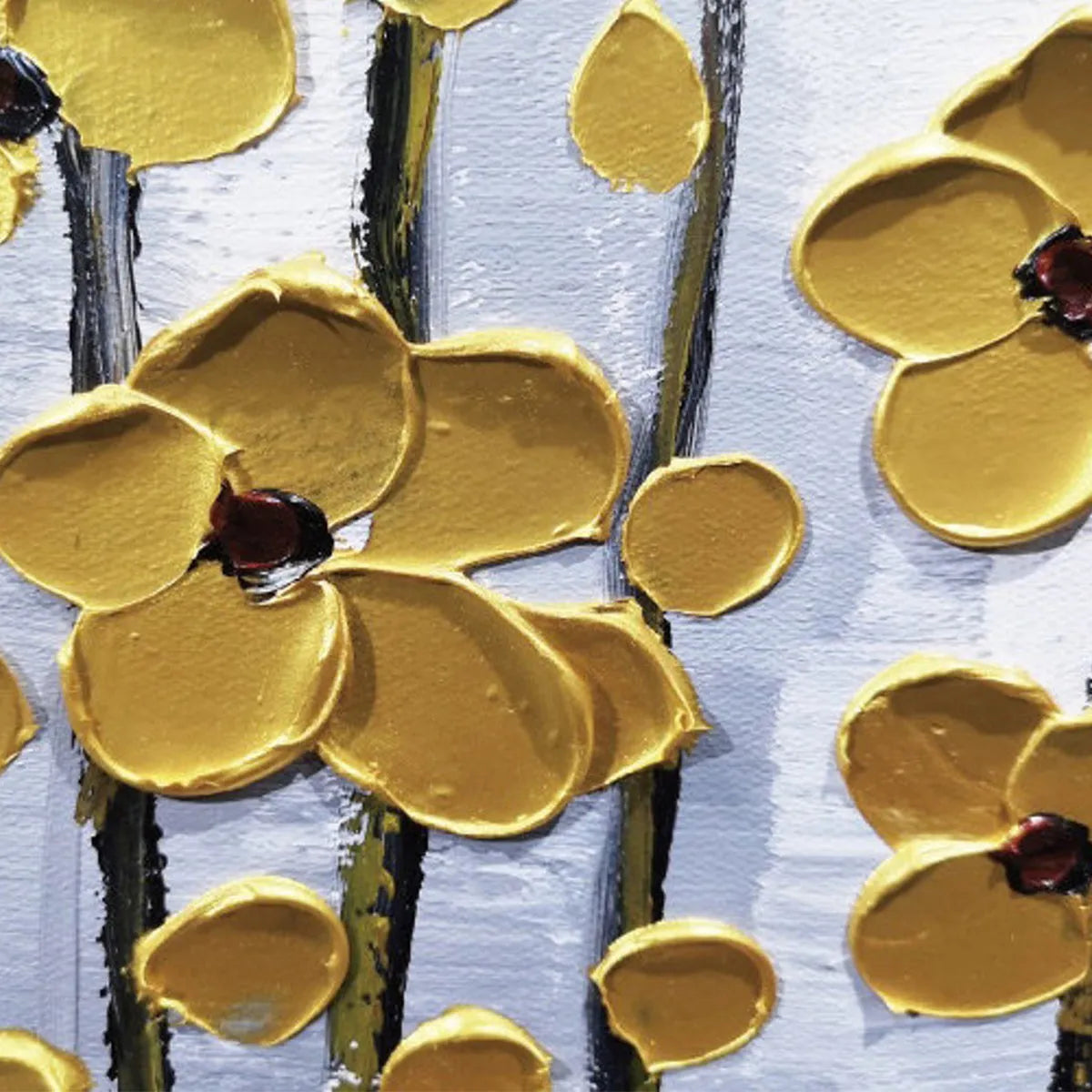 Close-up of hand-painted golden flowers on a minimalist abstract canvas.