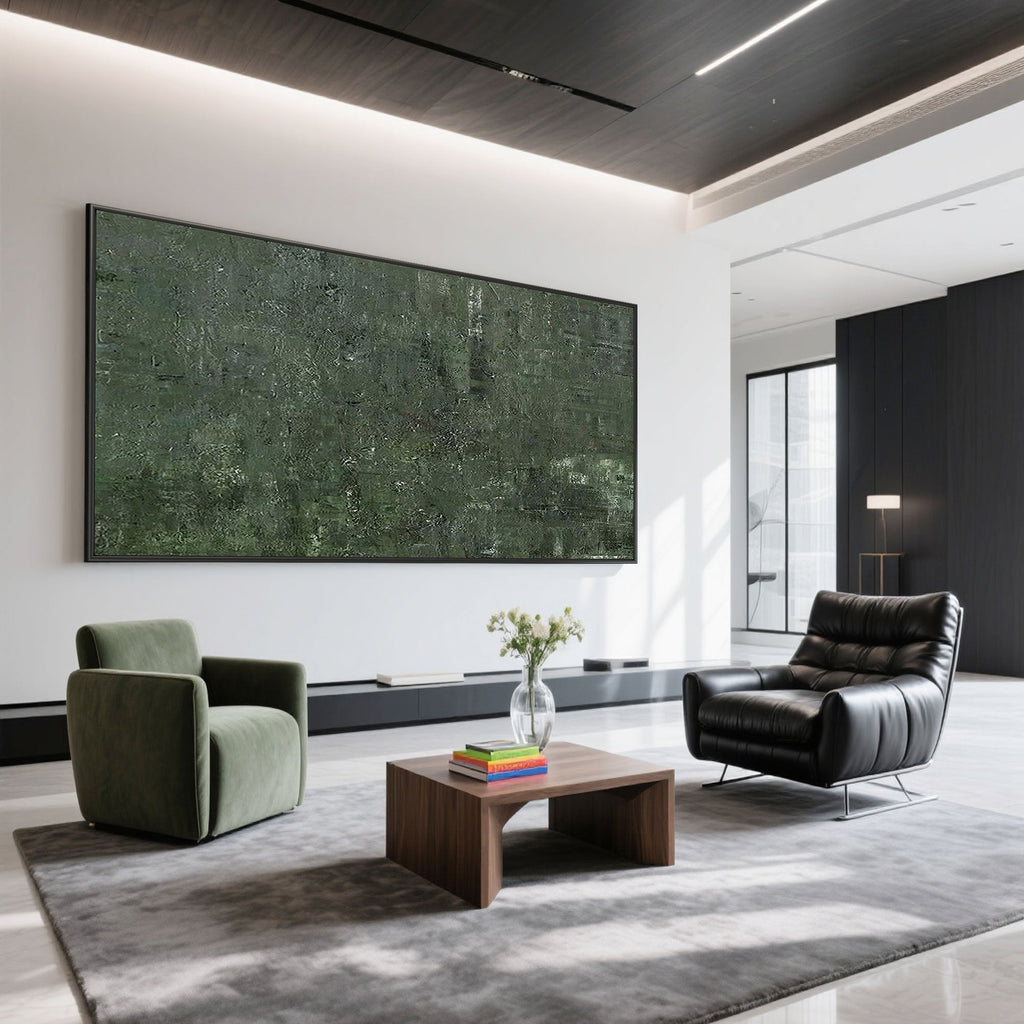 Minimalist Mossfield green painting in a modern living room with armchairs.