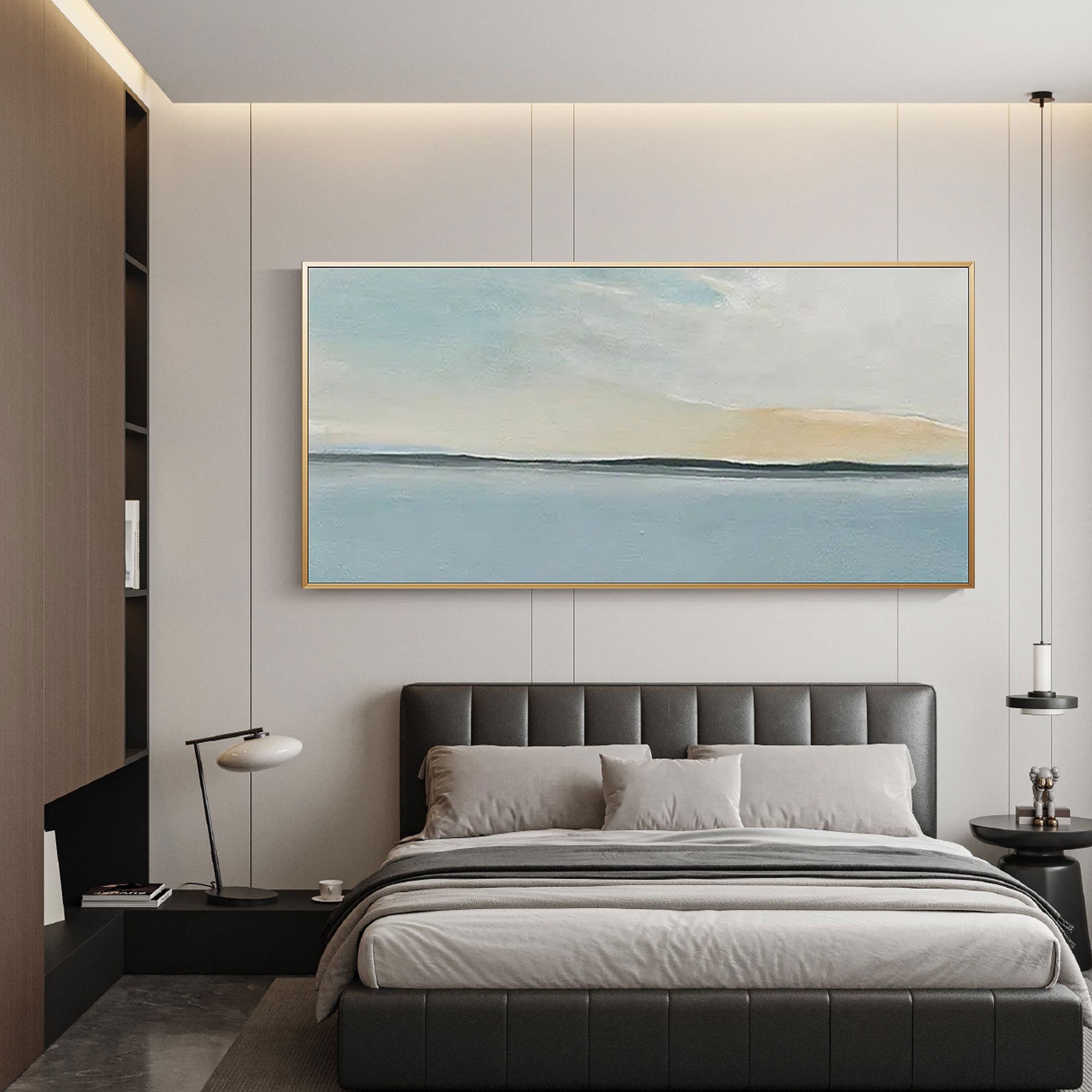 Minimalist horizon art with a gold frame in a modern bedroom setting.