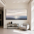 Minimalist sunrise seascape canvas art in a modern home interior.