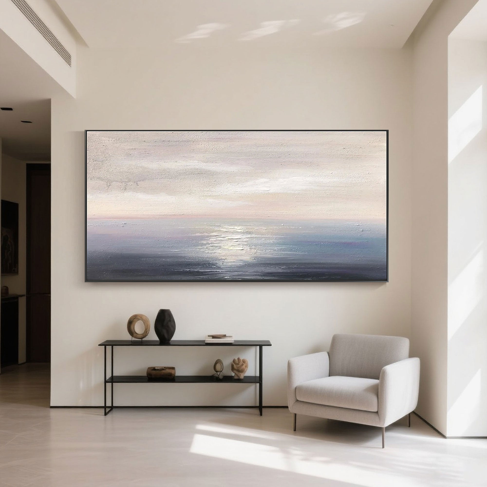 Minimalist sunrise seascape canvas art in a modern home interior.