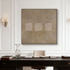 Lumi Gallery's Wabi-Sabi geometric canvas art with three textured squares over office desk