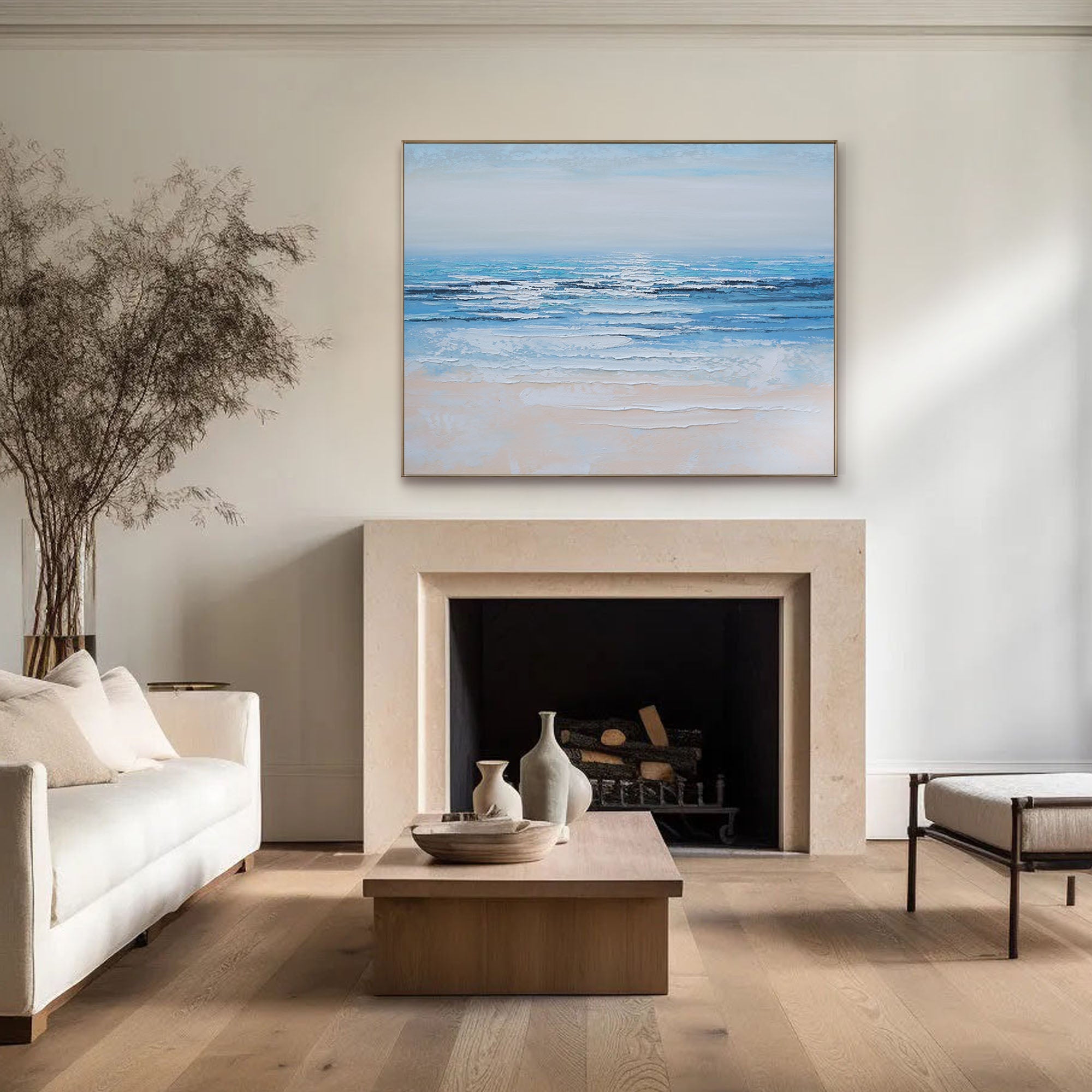 Coastal wall art, Silent Shore, displayed over a fireplace in a bright living room.