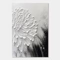 Monochrome 3D flower painting of a white blossom on a black and grey canvas.