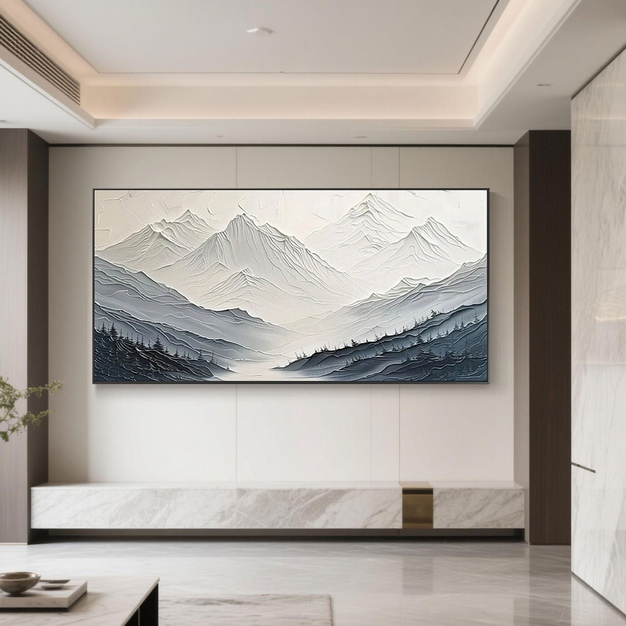 Minimalist mountain landscape canvas art in white, blue, and beige.