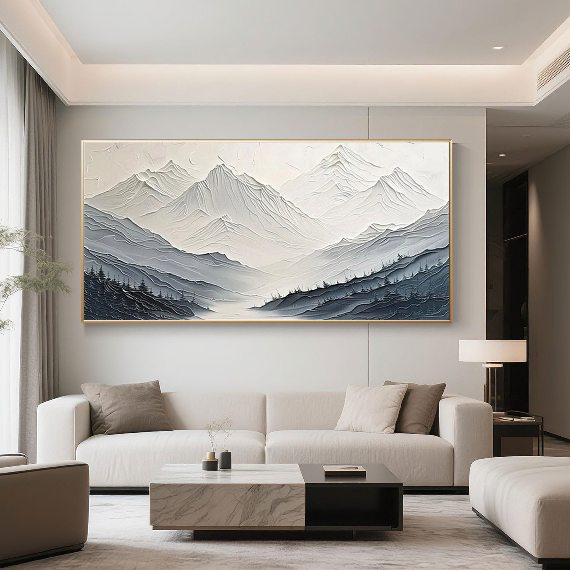 Minimalist mountain art with a gold frame in a living space.
