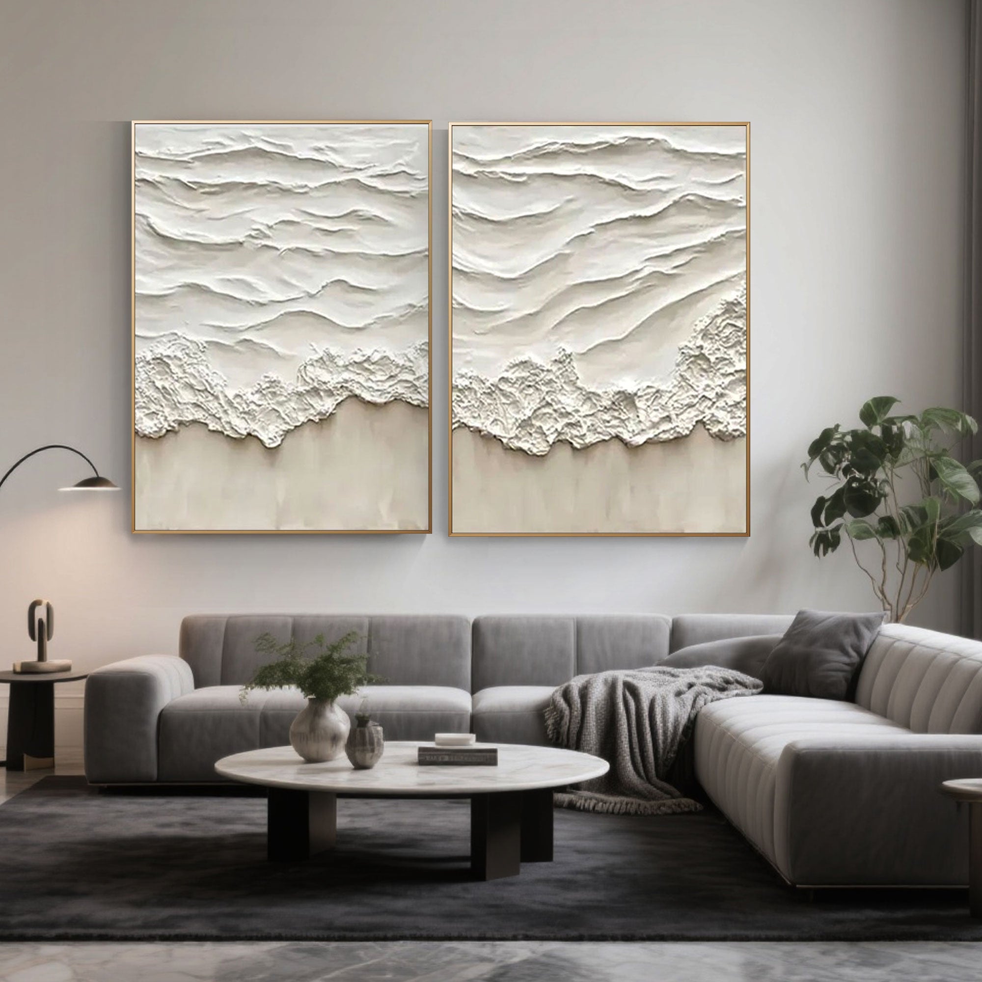 Wave Trace canvas art with gold frames above a gray sofa in a stylish room.