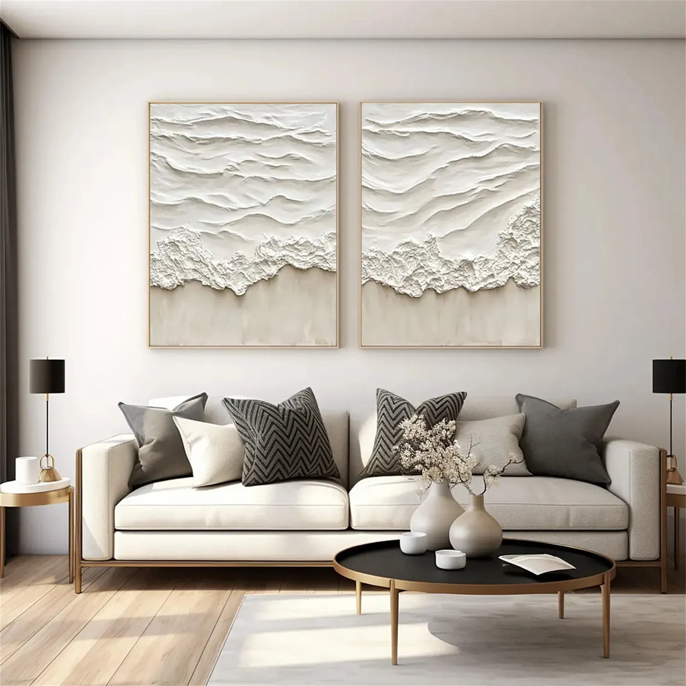 Seascape canvas art in a living room setting with a white sofa and gold frames.