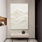 Neutral textured mountain wall art in a modern interior.