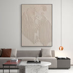 'Traces' minimalist art above a sofa in a contemporary living room setting.