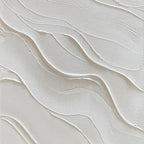 Textured beige and white wave wall art close-up.