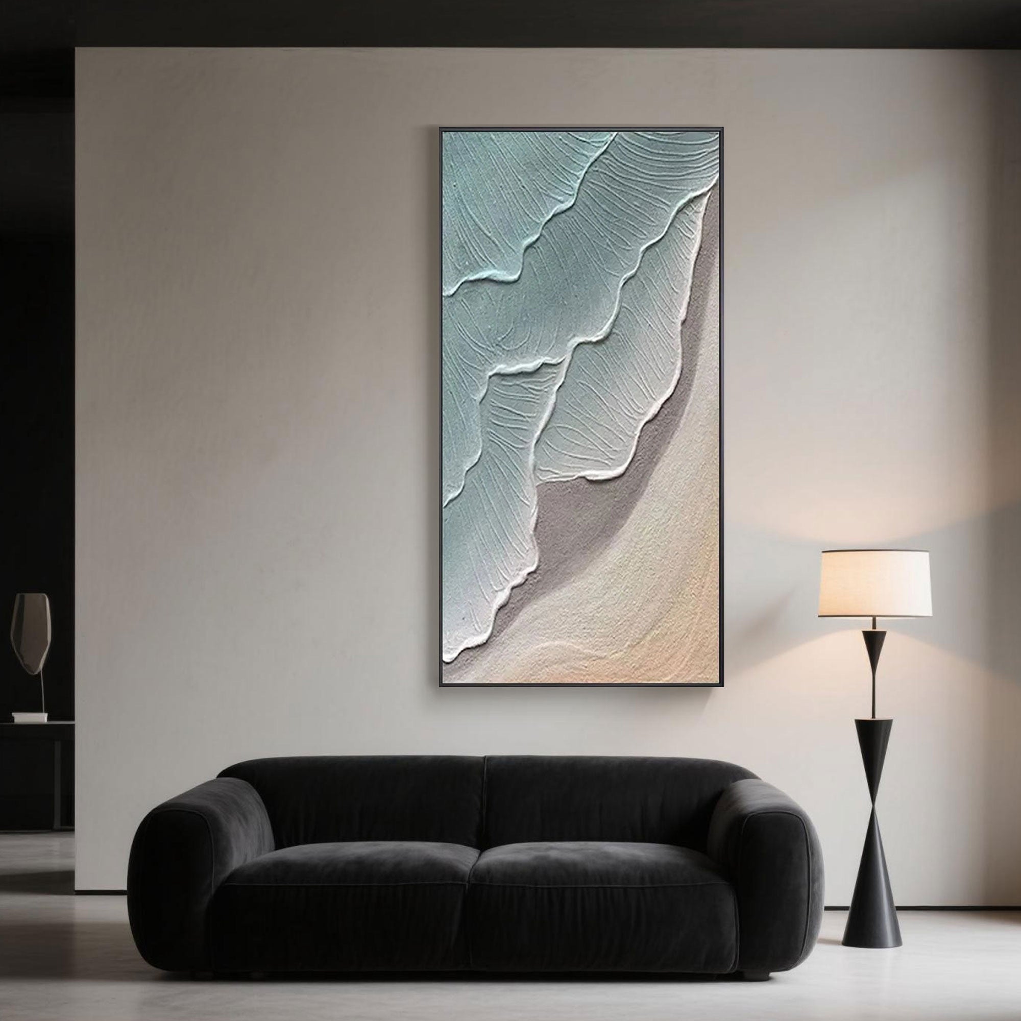 Contemporary living room design accented with a vertical abstract seascape wall painting, hand-painted in minimalist blues and sandy beige.