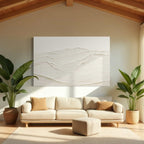 Modern living room with large abstract wall art, paired with [颜色] fabric sofa and round wooden coffee table, enhanced by potted greenery in corner