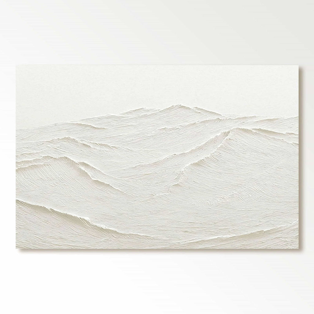 Minimalist white textured abstract painting resembling sand dunes or snow ridges, with soft undulating lines and subtle tonal variations, evoking serenity and vastness on neutral background