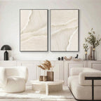 Gallery view: Beige Silent Surf art with black frames enhances modern decor.